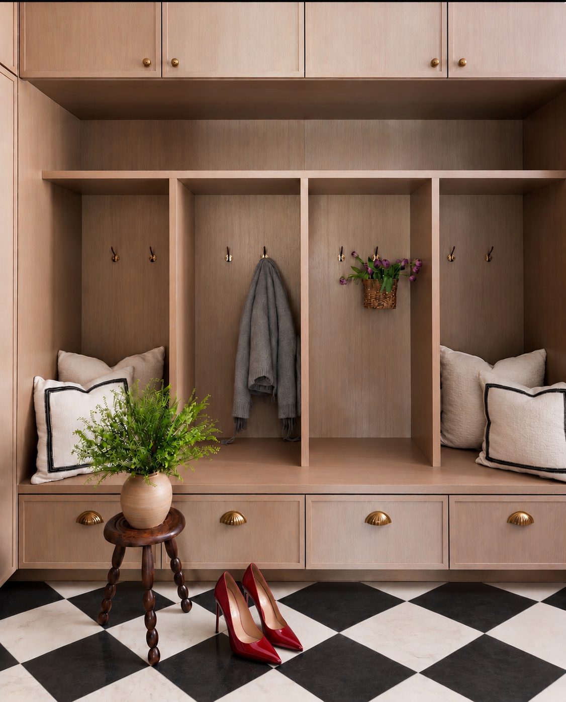 Custom white oak mudroom lockers in a Mysona custom home